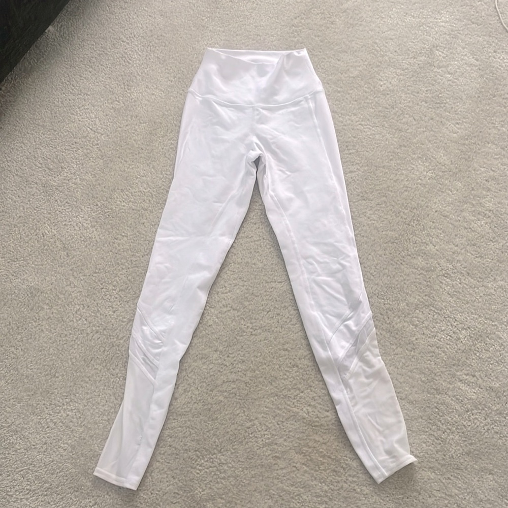 Pure white Alo yoga pants w/ mesh siding